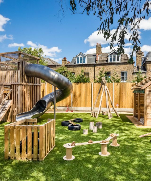 N Brixton nursery garden with a slide and play structures