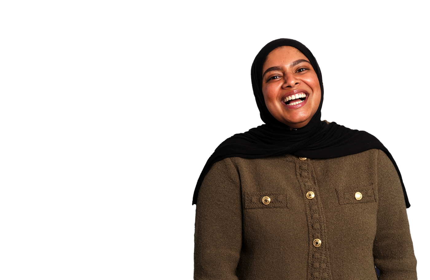 A woman in a headscarf smiling