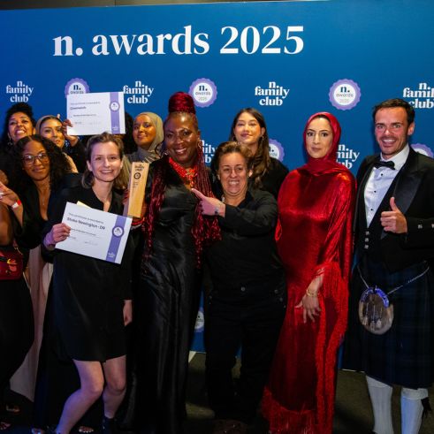 N award winners smiling and holding their certificates at the N Awards 2025 celebration.